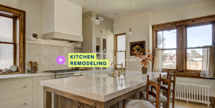 kitchen remodel Birmingham MI with painted cabinets wood island stone countertops and brass fixtures