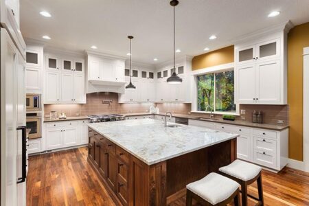 modern kitchen remodel in Birmingham MI with open layout custom cabinetry and quartz countertops