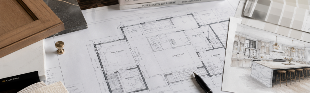 Luxury interior design plans and kitchen remodeling selections in Birmingham MI featuring architectural drawings, cabinetry samples, and high-end design materials by Maxwell Building Services