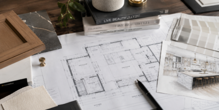 Luxury interior design plans and kitchen remodeling selections in Birmingham MI featuring architectural drawings, cabinetry samples, and high-end design materials by Maxwell Building Services