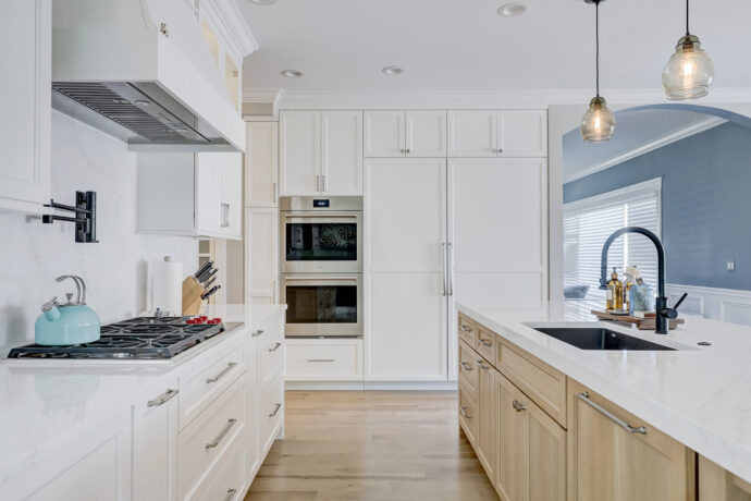 Double Sub Zero refrigerator with integrated cabinet panels in Birmingham Michigan kitchen remodel