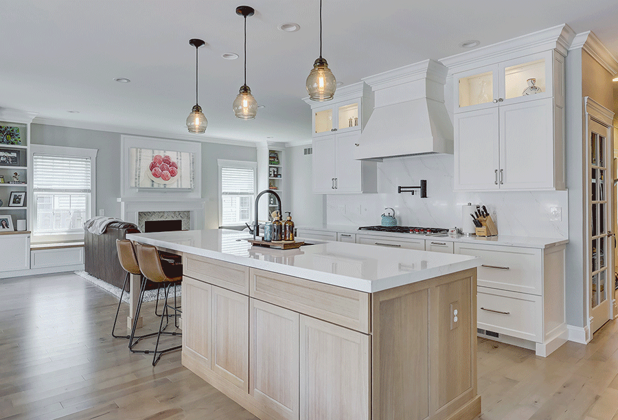 Luxury kitchen remodel in Birmingham Michigan with custom cabinetry and open concept floor plan