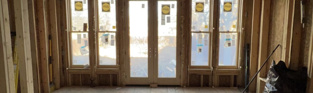 Bank of Pella historic-series windows installed in the framed walls of a new first-floor addition on a 1906 Detroit Tudor.