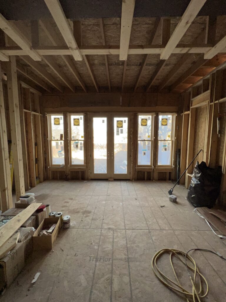 Bank of Pella historic-series windows installed in the framed walls of a new first-floor addition on a 1906 Detroit Tudor.