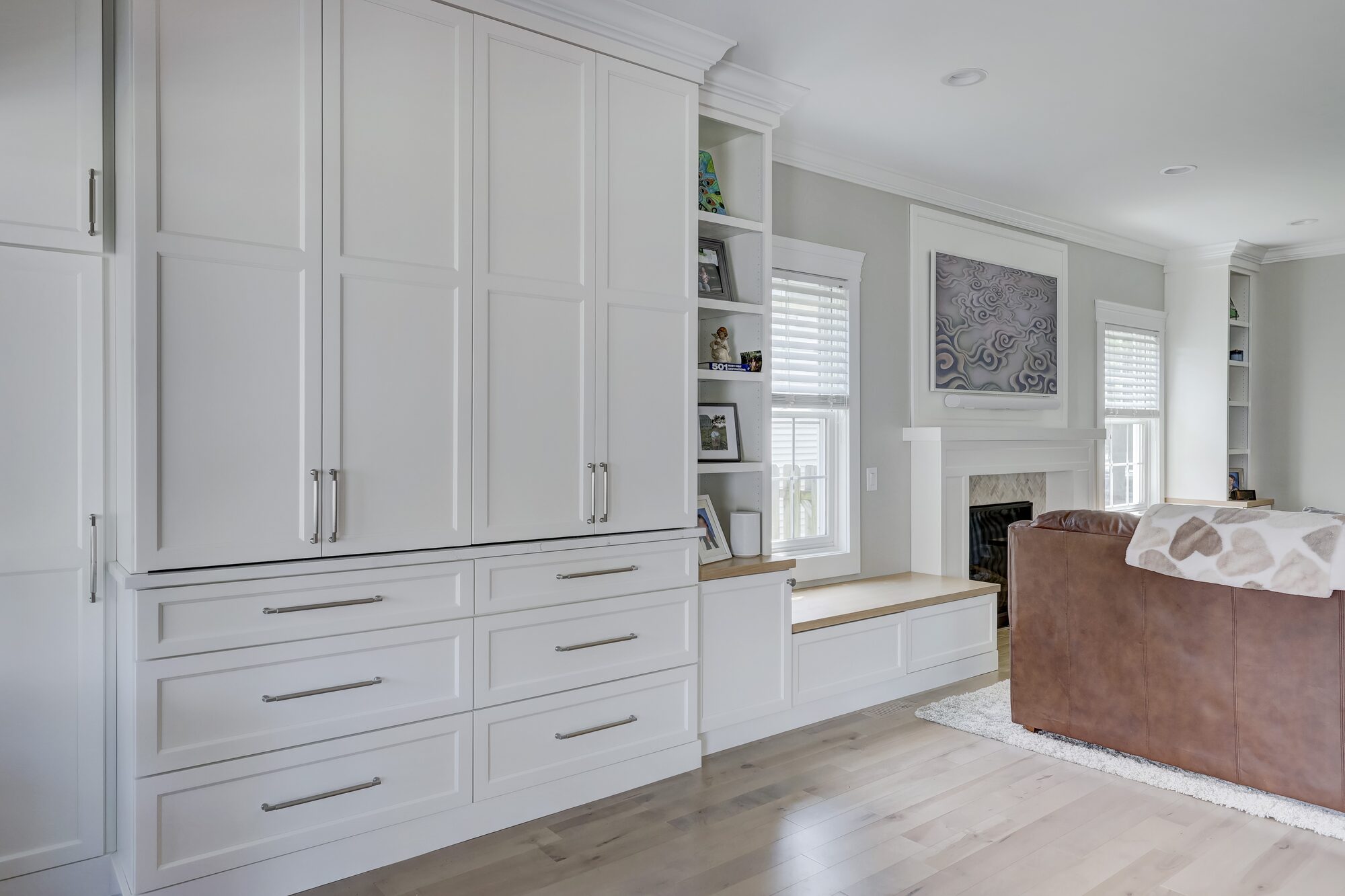 Built in cabinets and french doors in a remodeled Birmingham MI living room